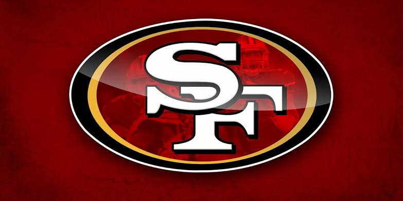 The San Francisco 49ers logo on a deep red background — the team rated first in the Week 2 power rankings.